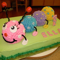 Fuzzy Caterpillar This was for my granddaughter's 1st birthday. The theme was 'Fuzzy Wuzzy Caterpillar'. It's all buttercream with...