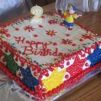 Caillou Birthday Cake This cake was for a 2 year old's birthday that has the Caillou character on it-Caillou is a PBS character