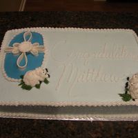 Lambs And Cross Was done for a baptism. All buttercream except the cross which is fondant. Thanks for looking!