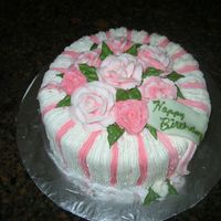 Dscn3311.jpg This was the first time that I tried this design. My thought was a large gerbera daisy in the middle, but that didn't turn out at all...