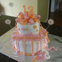 Lots Of Firsts There are a lot of "firsts" on this one! It was the first time making a bow, streamers, standing numbers, and wired daisies. The...