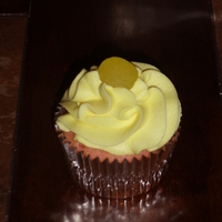 Lots Of Cuppies! Strawberry Lemonade-Strawberry cake with Lemon buttercream and a lemon drop on top.