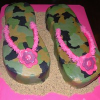Flip- Flops In Camo Freanh Vanilla butter cake, buttercream camo, fondant hot pink thongs and buttercream pink fringe, with sand accents !