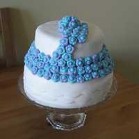 Small "just Because" Cake I made this cake to try the little flowers and the scalloped bottom. Definitely some inspiring photos on here. The bottow layer is 6"...