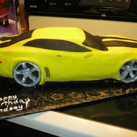 Bumblebee Camaro This is a 1/18 scale Transformer Bumblebee Camaro. I made the pan myself and handcarved the finishing touches. The wheels are molded in...