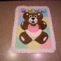 Teddy Bear I made my own baby shower cake, the blanket is made out of fondant..
