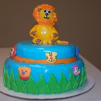 Jungle Cake Made this cake for my son's preschool graduation. Two tier covered in MMF. Lion made of MMF.