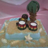 Carribean Themed Beach Cake I was asked to make a Carribean themed cake for the Marie Curie centre as a raffle prize, The cake is Madeira with Buttercream and covered...