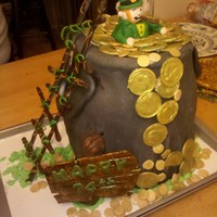 Mom's Birthday Cake My mother is Irish so I wanted to make her a cake using that theme. I made the coins a couple of days ahead of time out of gum paste so...