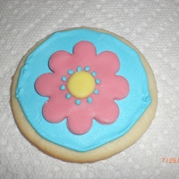 Flower Cookies 1st time working with MMF. Background is iced with Royal Icing.