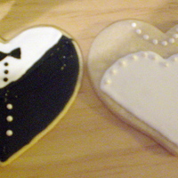 Bride And Groom Hearts Covered in royal icing and sugar pearl detail.