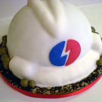 Hard Hat Cake This is my first 3D cake made for a pipeline construction company. The rocks are fondant and the dirt and sand is brown sugar and dried...