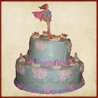 Super Mom One of my first cakes. I hadn't learned about how to support them yet to keep them from falling in. I know now.