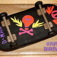 Skateboard Birthday Cake My 8 yr old son requested a skateboard bday cake this year. First time using fondant (used Duffs) and I was really nervous. I tried...