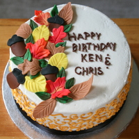 Autumn Birthday Chocolate and white cake with raspberry filling, buttercream frosting, fondant leaves. First time using Indydebi's BC recipe~ from now...