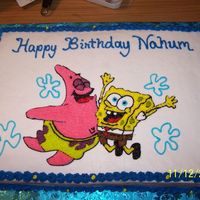 Spongebob This is for a one year old little boy, white cake with buttercream frosting.