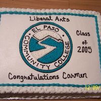 Graduation Cake Graduation Cake. School logo drawn on and then filled in witha star tip.