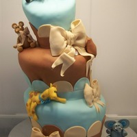 Animal Themed Baby Shower Cake This was my interpretation of a topsy turvy for a nursery animal themed shower cake for my good friend daughter! they loved the cake and...