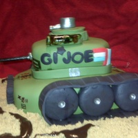 Gi Joe Birthday Cake Tank GI Joe cake Made out of chocolate cake and filled with cocholate chip buttercream covered in fondant and gumpaste details. Thanks for...