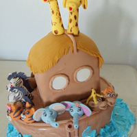Noah's Ark Baby Shower Cake Fondant covered cake with all handmade gumpaste animal toppers made for a friends baby shower.