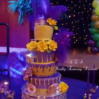 Mardi Gras Quinceanera Cake I made this cake for cousin Kimmy's Quinceanera party. I really worked my butt off like never before! I made 10 roses and 5 blew away...