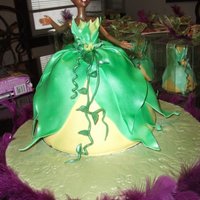 Princess Tiana Doll Cake This doll cake is Dominican cake filled with Guava filling and decorated with fondant and gumpaste details. Thank you for looking!
