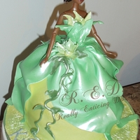 Princess Tiana Dress Cake This cake was for my friend's little girl! sooo cute i love these princess cakes! I made boxed cupcakes and mini Tiana Dress cakes all...