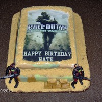 Call Of Duty First cake ever! My son wanted a Call of Duty cake for this bday. MMF for the camo look on cake. Chocolate cake w/Chocolate BC frosting....