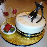 Happy New Year Champagne cake, strawberry filling , champagne buttercrem frosting covered with fondant, royal icing numbers. Thanks CC friends for the...