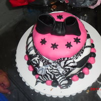 Larissa's Birthday Cake My boyfriend decided that for my birthday present instead of me making my cake he would make it for me.He did a practice cake then he did...