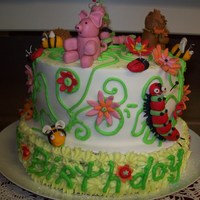 Grandaughters 8Th Birthday Cake Chocolate cake with butter cream and white fondant, all bugs and animals made from fondant. Was a fun cake to do!