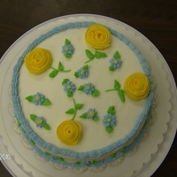 Wilton Basics Course Final Cake This was my final cake for the Wilton cake decorating basics course. I was inspired by a platter that I have. At least one of my flowers...