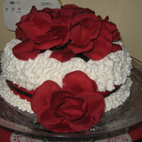 Anniversary Cake Messed up what I wanted to do with this, so I just piped stars all over to cover up my boo-boos and added silk flowers and ribbon. For a...