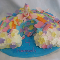 Rainbows And Butterflies This is a cake I did for a friends daughter's fourth birthday. It is a yellow cake with vanilla butter cream icing and fresh...