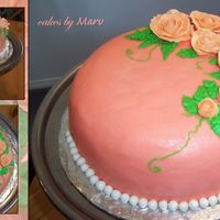 Birthday Roses' Cake A double layer marble cake with buttercream filling and frosting, royal icing roses and marshmallow fondant pearls border.