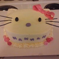 Hello Kitty Cake With Ribbon Roses chocolate cake and vanilla buttercream and fondant accents