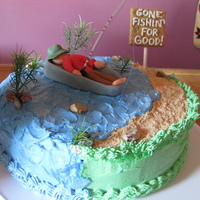 Gone Fishin'--For Good! The cake is iced in buttercream, and the fisherman is made from fondant (my first ever attempt at using fondant). The sand is made from...