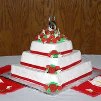 Simple Rose Red velvet with buttercream frosting. Royal icing roses. My first wedding cake