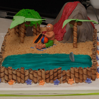 Beach Birthday Cake Birthday cake for my friend's 7 year old. Half chocolate, half yellow cake. Marshmallow fondant with gumpaste figures. The volcano is...
