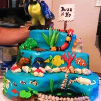 Pet Shop Cake This cake was made for the Aquarium & Pet Shop where my husband works for their summer picnic. It incorporates something from every...