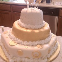 50Th Birthday Cake 3 tiered cake with gold painted stars/circle cutouts