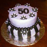 50Th Bday For Purple Lover This is my second attempt at a fondant covered cake, and first at tiered cake!