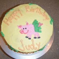 Hawaii Theme Birthday Cake 8" Marble Cake with Buttercream.The Customer wanted Yellow, a Pig, and Hawaii incorporated.. so here's what they got!!! Thank God...