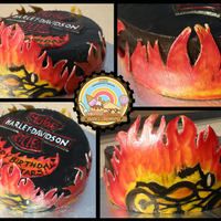 Harley Davidson This is a cake I made for a Harley Davidson Fan...The flames were painted on fondant cutouts. Homemade Fondant. Wilton Gel colors. TFL