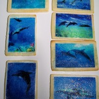 Dolphin Cookies Created in honor of my elderly friend Ann, who loved dolphins and the sea, for the reception following her memorial services. The edible...