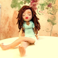 Little French Girl Out Of Gum Paste This is a gum paste figure that will be a part of a "Paris" Birthday Cake in a few weeks. Eifle Tower will also be a part of it...