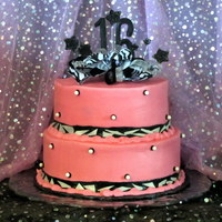 Sweet Sixteen In Pink & Black This is a vanilla cake with White Chocolate Cream Cheese Butter Cream. Two tiers.
