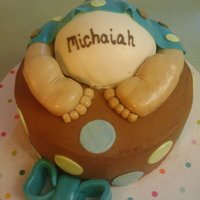 Baby Shower Cake This cake was made for a freinds Baby shower. It is all cake, the ffet are fondont.