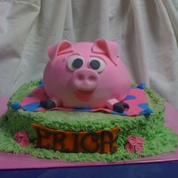 Little Piggy hand carved little pig cake for a little girls birhday.