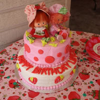 Strawberry Shortcake Made this cake for my daughters 1st Birthday. Top tier was white cake with strawberry filling and bottom tier was strawberry cake with BC...